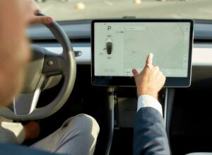 A man driving a car with gps